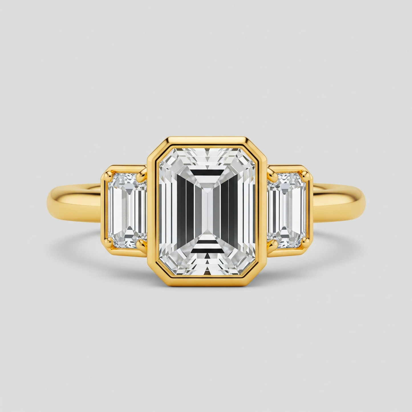 Bague trilogie émeraude serti clos